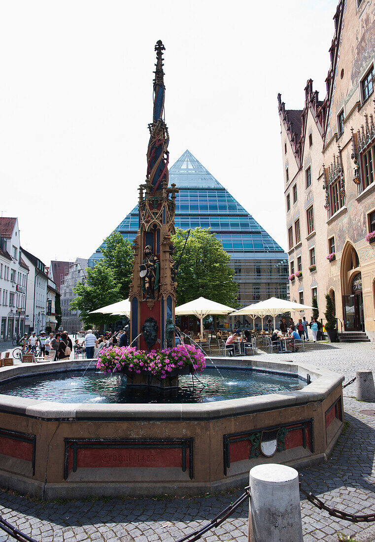 Fountain In The Marketplace With The New Central Library In The Background; Ulm Baden-Wurtenburg Germany