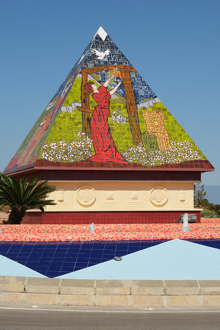 Ceramic Tile On A Pyramid Structure In A Traffic Roundabout; Alaurin De La Torre Malaga Spain
