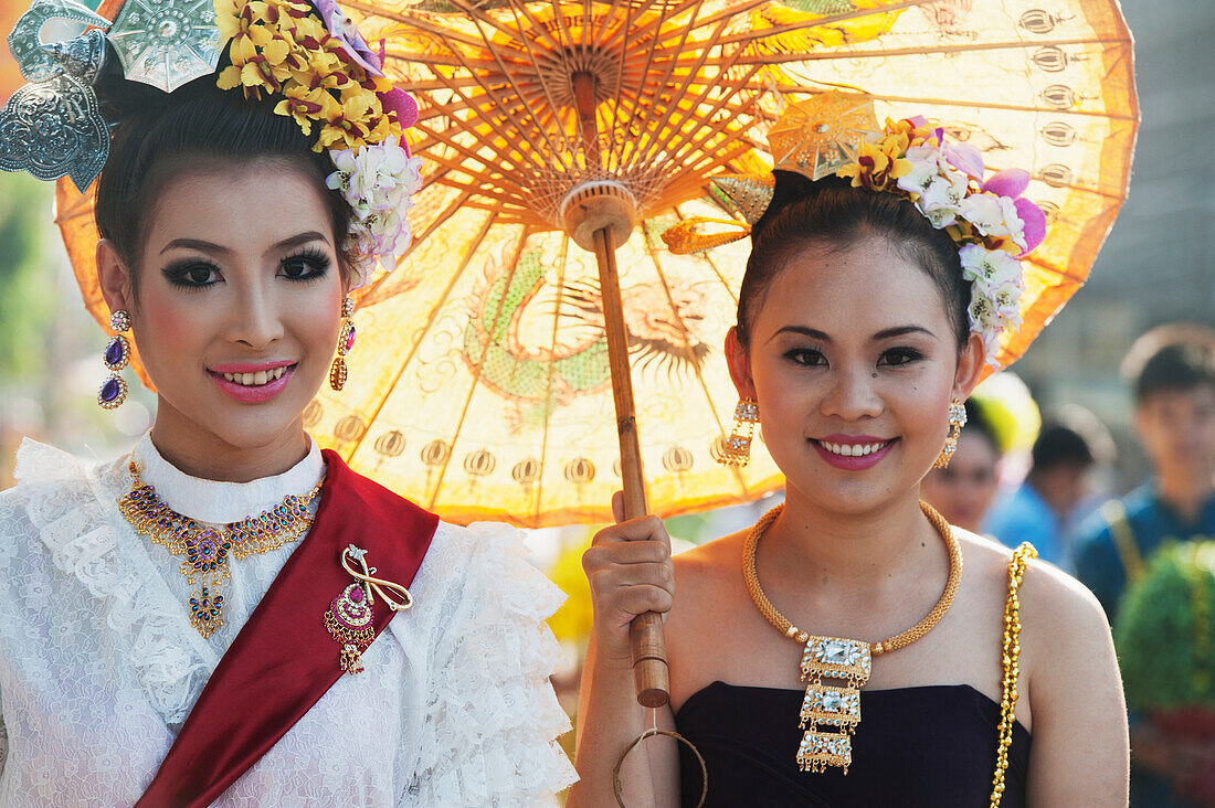 Young Women Dressed For The Chiang Mai Flower Festival Parade; Chiang Mai Thailand