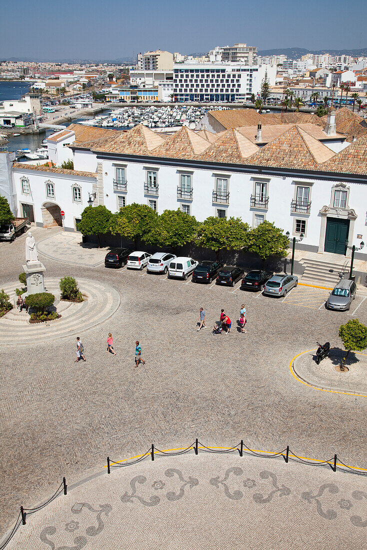 Pedestrians Walking In The Street; Faro Algarve Portugal
