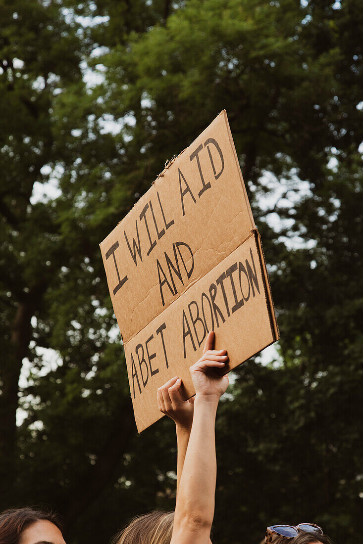 I will Aid and Abet Abortion! Sign at Abortion Rights Rally, Washington Square, New York City, New York, USA