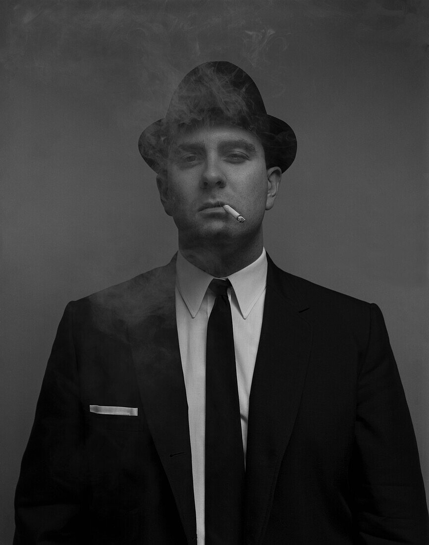 Half-Length Portrait of Businessman Smoking Cigarette