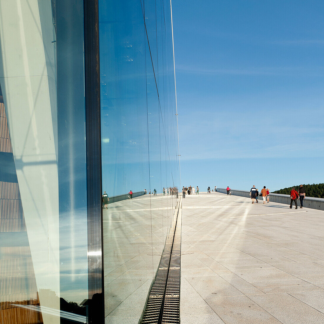 Pedestrians On A Walkway Outside Oslo Opera House; Oslo Norway