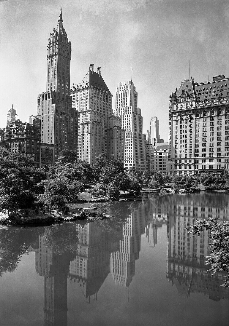 View from Central Park, Sherry-Netherland Hotel (left), Plaza Hotel (right) with Reflections in Lake, New York City, New York, USA, Gottscho-Schleisner Collection, 1933