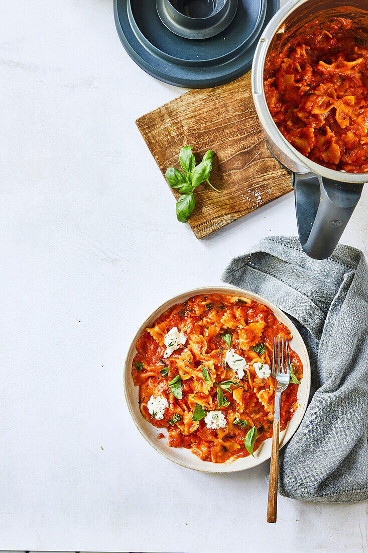 Farfalle with tomato sauce and cheese
