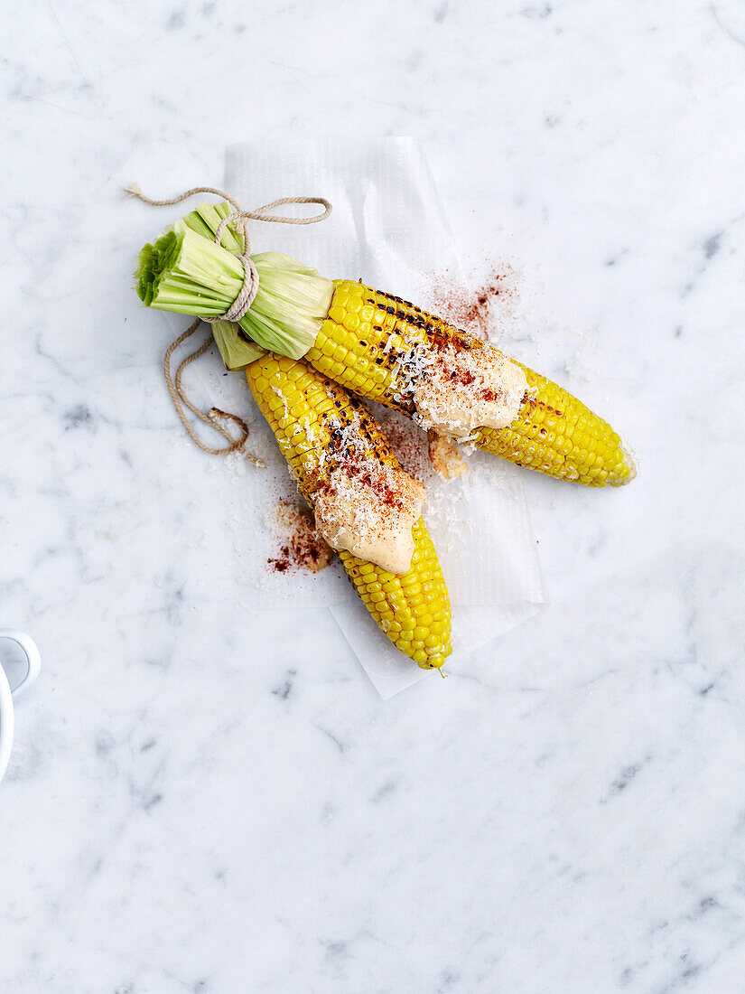 Barbecued corn cobs with Mexican mayo