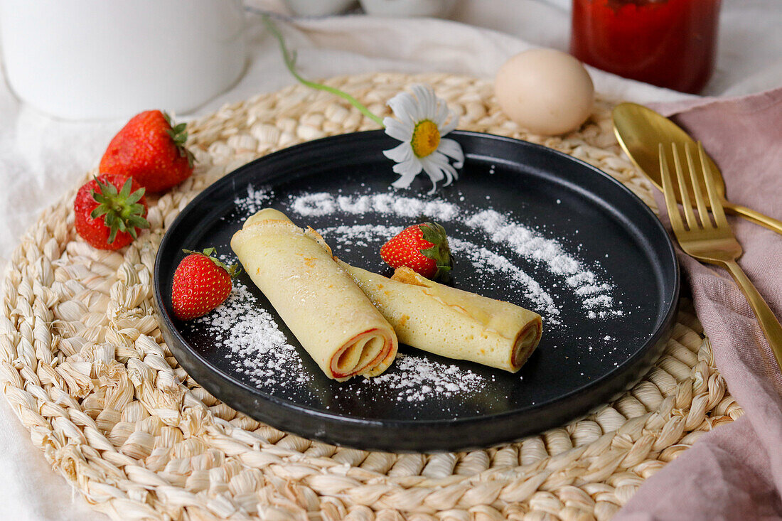 Pancake rolls with strawberry jam