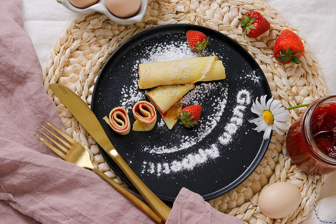 Pancake rolls with strawberry jam