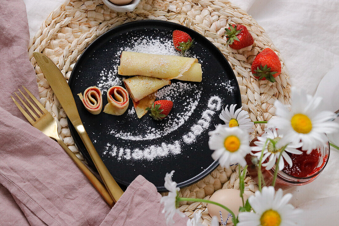 Pancake rolls with strawberry jam