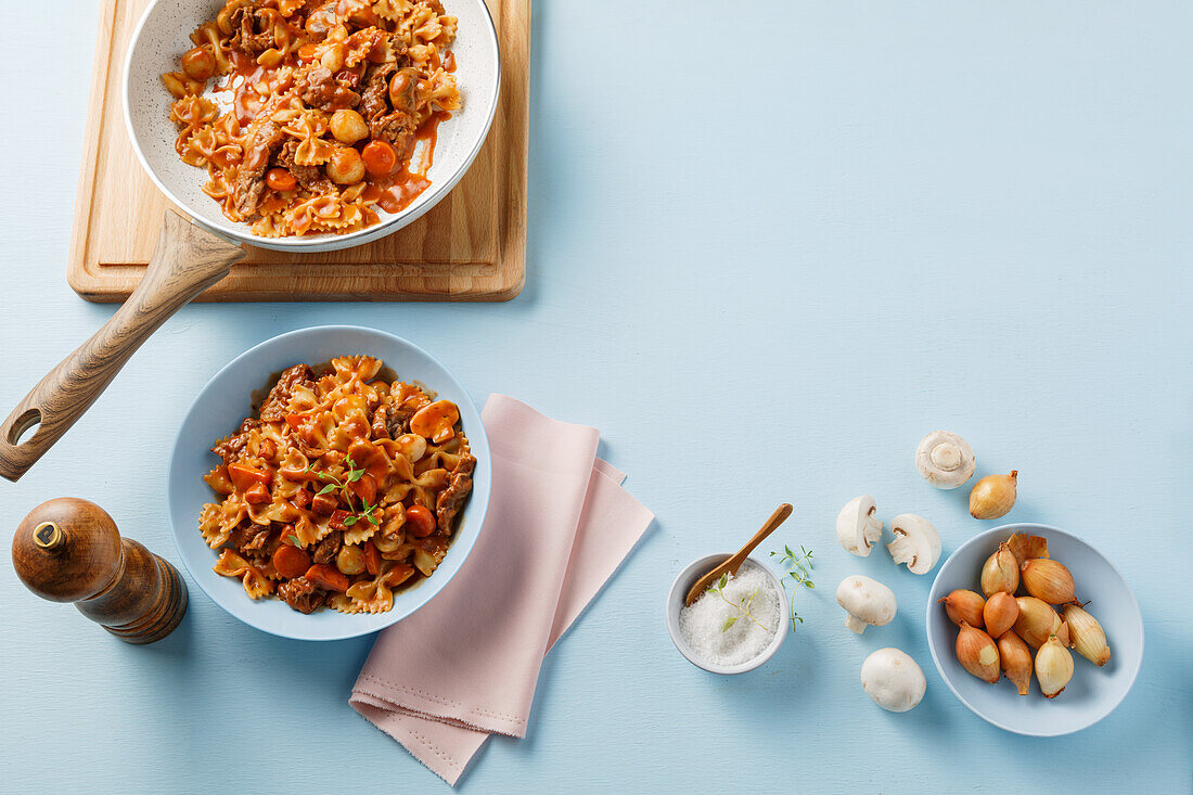 Pasta with bourguignon sauce, mushrooms and shallots