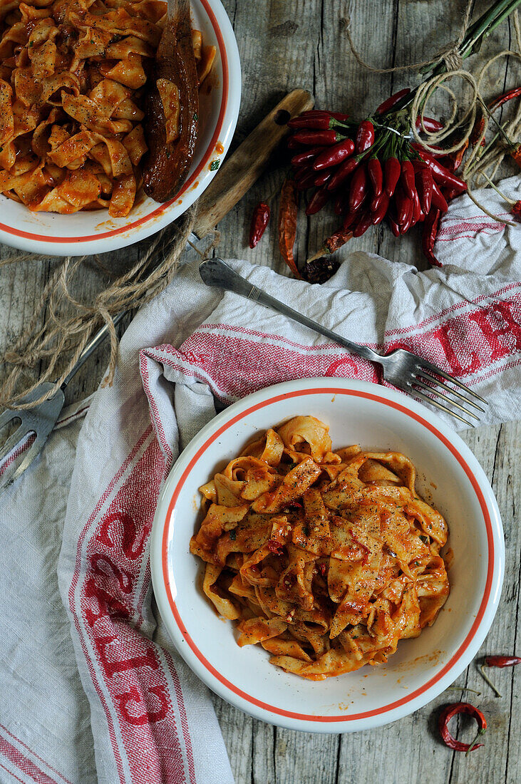 Hand-cut fresh egg tagliatelle with spicy tomato sauce