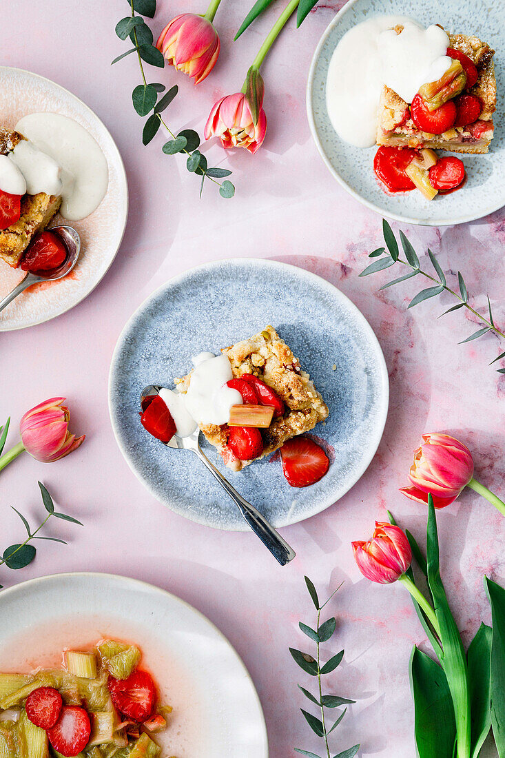 Crumble cake with strawberries, rhubarb, and vanilla yogurt