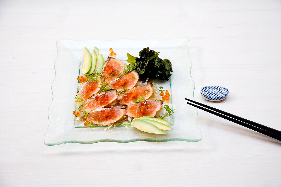 Salmon with trout caviar, avocado and seaweed (Japan)