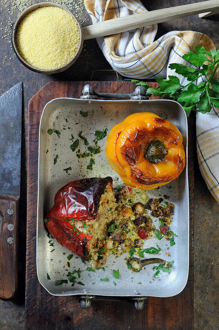 Baked peppers stuffed with polenta and vegetables