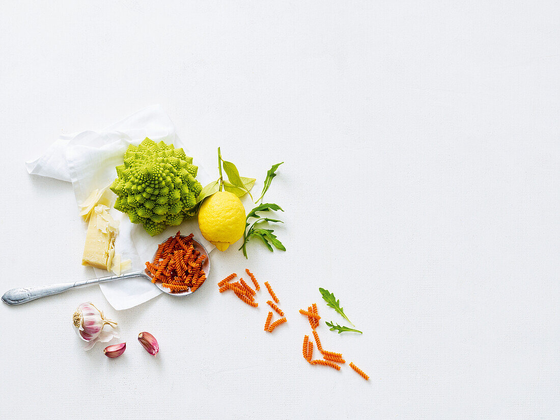 Romanesco, lentil noodles, lemon, rocket, garlic, Parmesan cheese