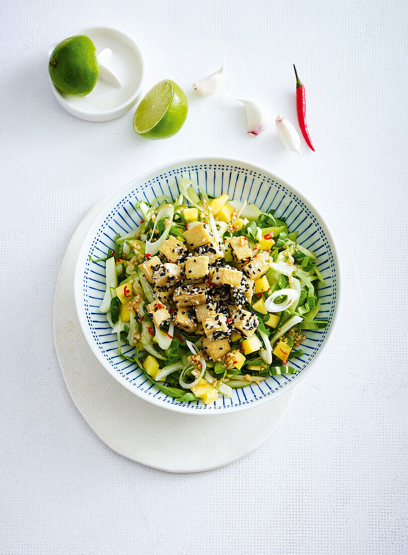 Vegan bok choy-mango salad with tofu