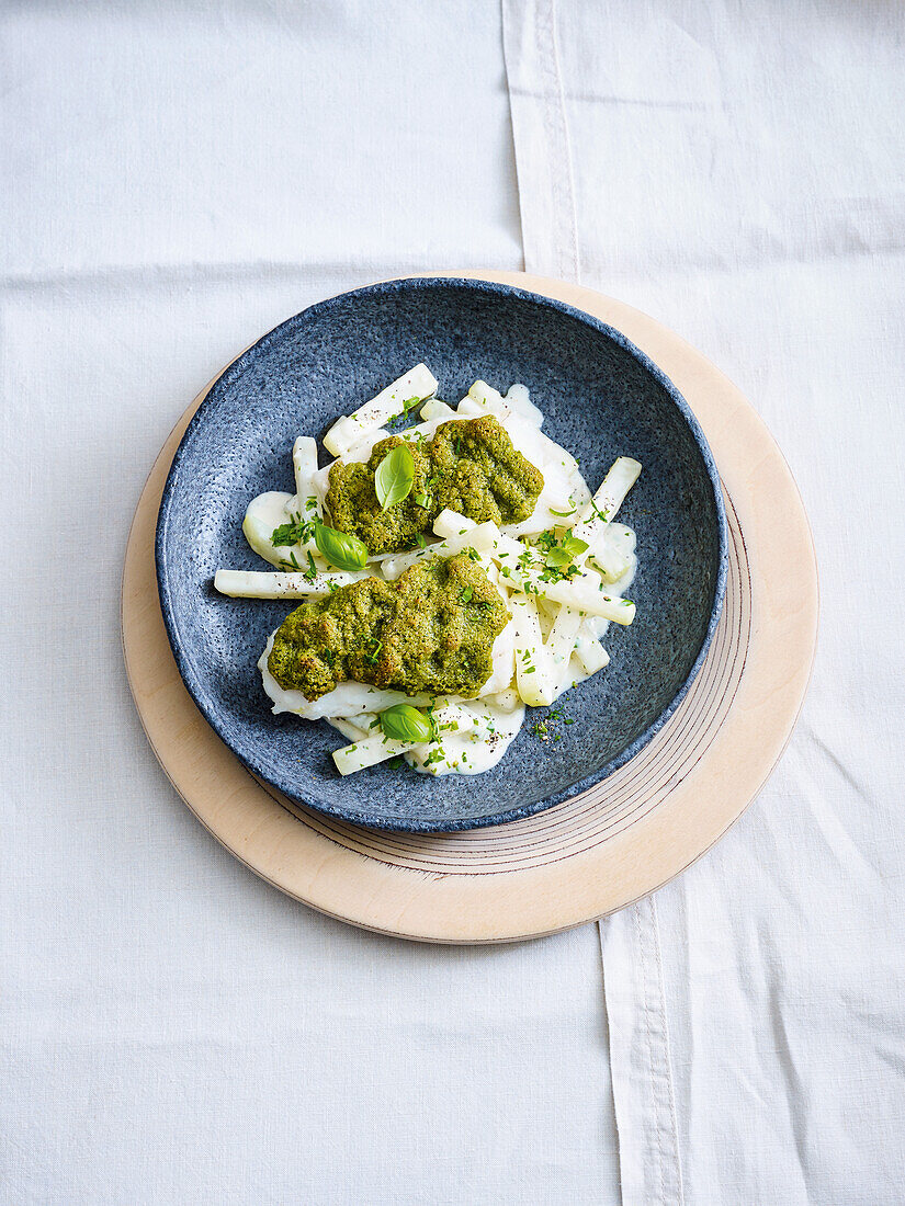 Pike perch fillet with pine nut crust on kohlrabi vegetables