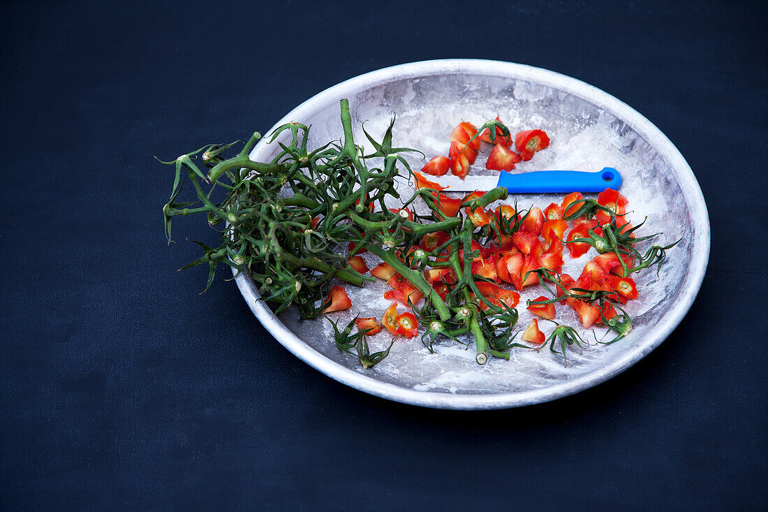 Leftover tomatoes and kitchen knife