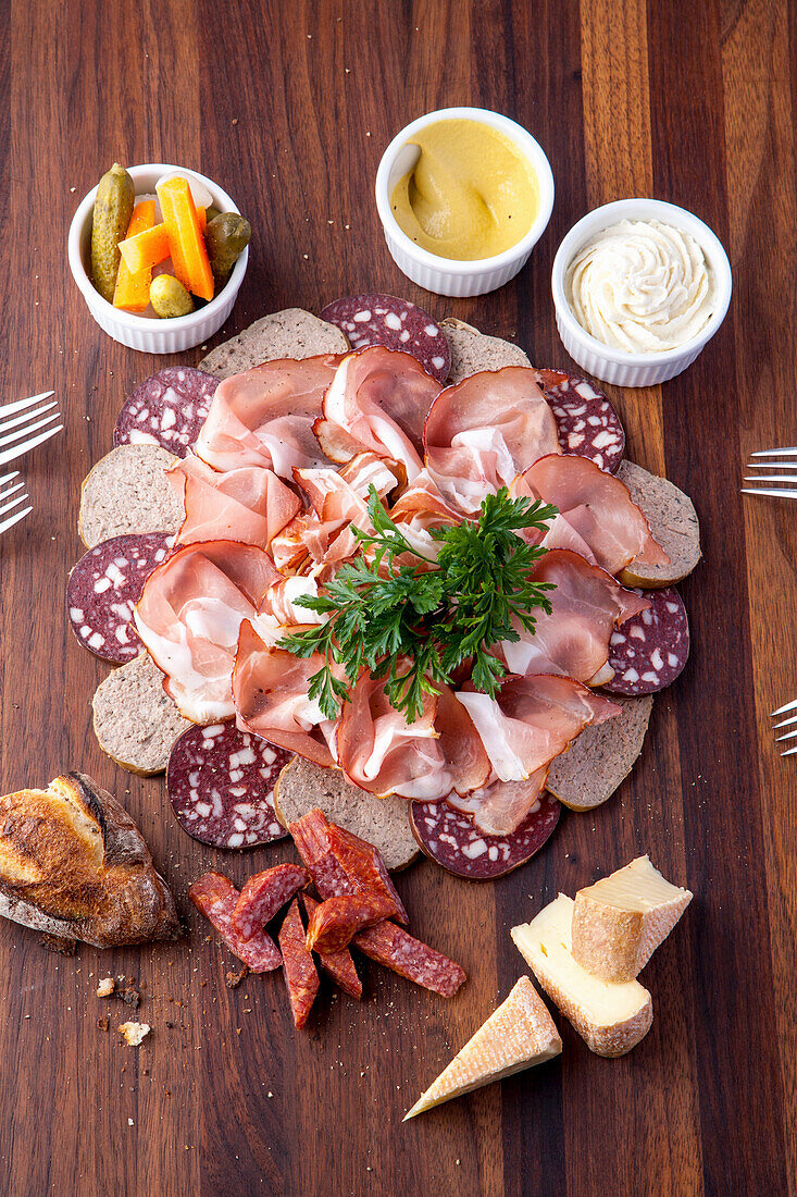 Sausage platter, mixed pickles, mustard and cheese spread