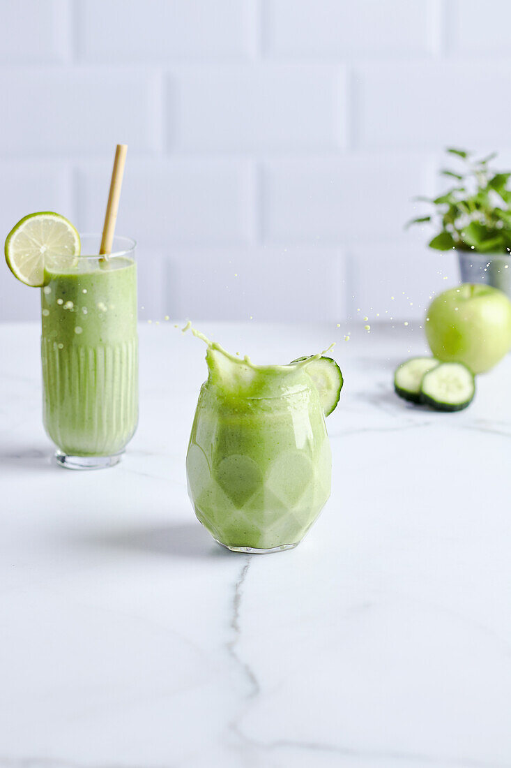 Green smoothie with cucumber, avocado and banana