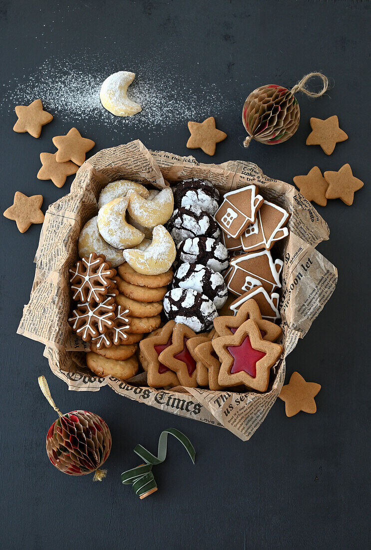 Assorted Christmas cookies (chocolate, peanut, half almond, ginger with caramel centre, gingerbread with icing)