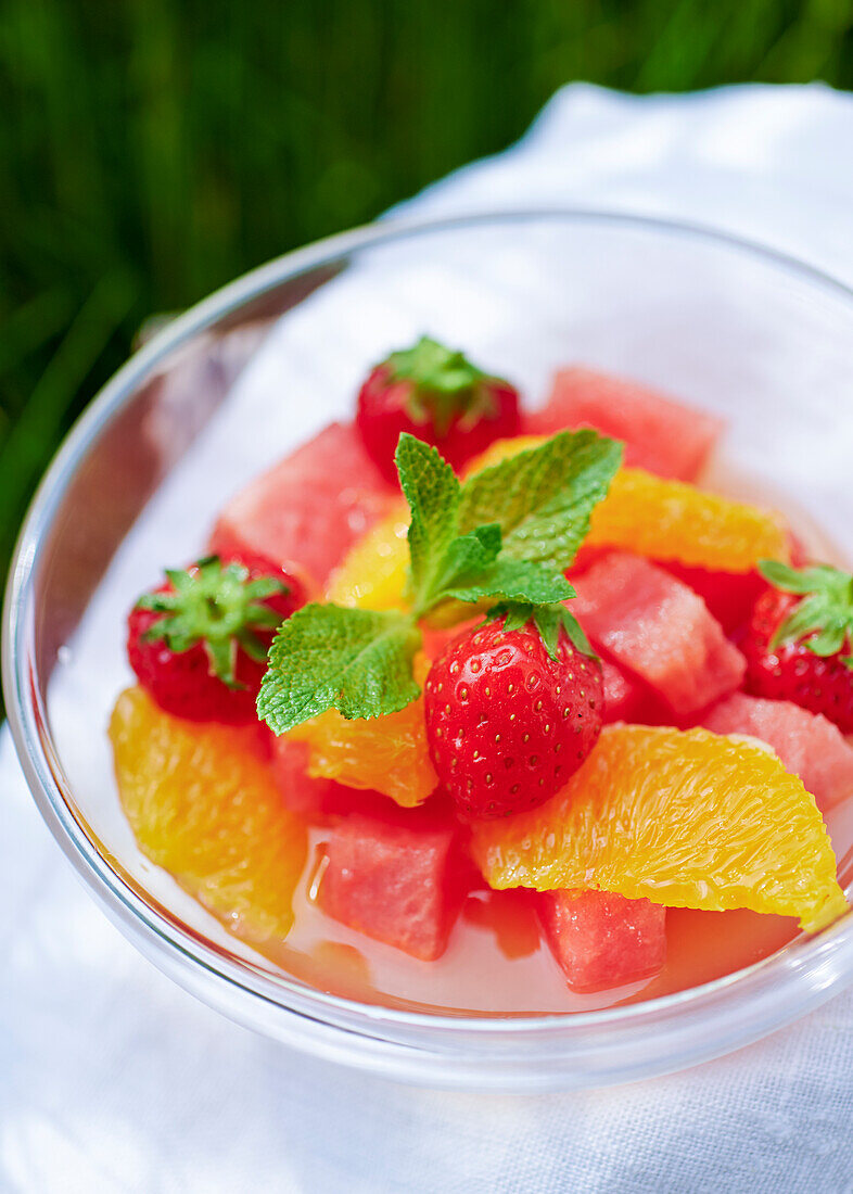 Melon-orange salad with strawberries