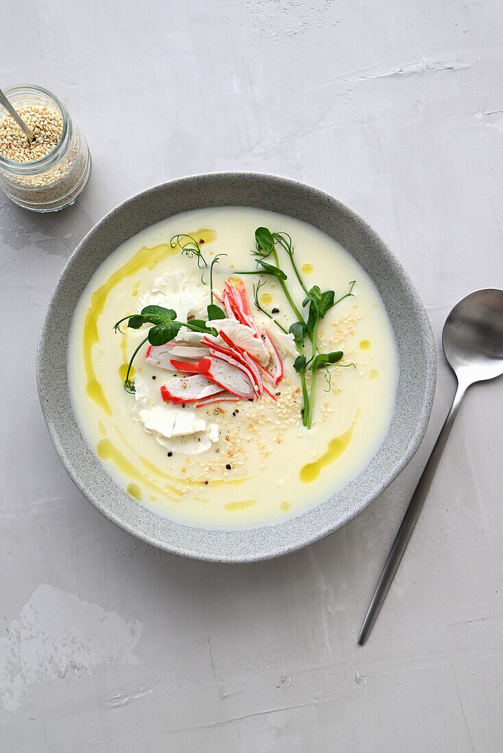 Creamy cauliflower soup with radishes