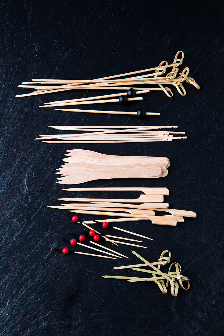 Assorted wooden skewers and wooden picks