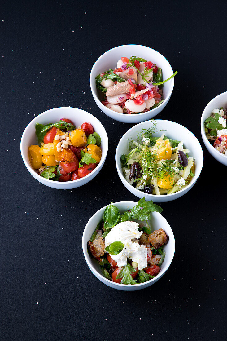 Assorted salads in bowls