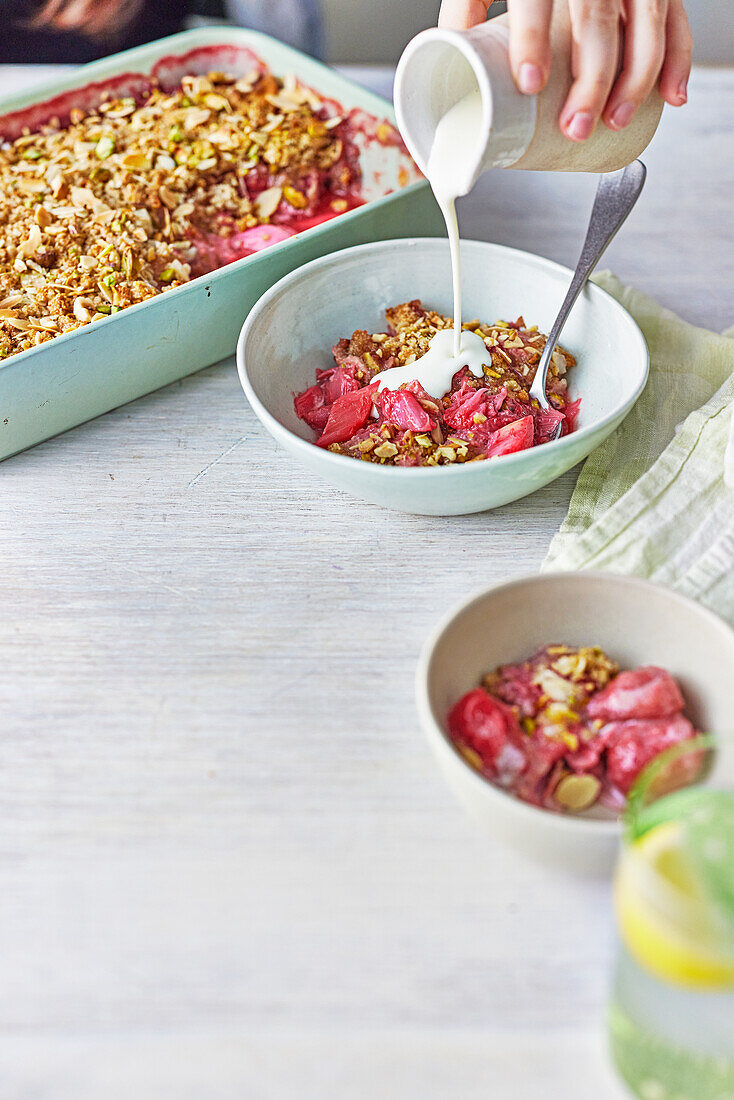 Rhubarb and strawberry crumble with cinnamon and nuts