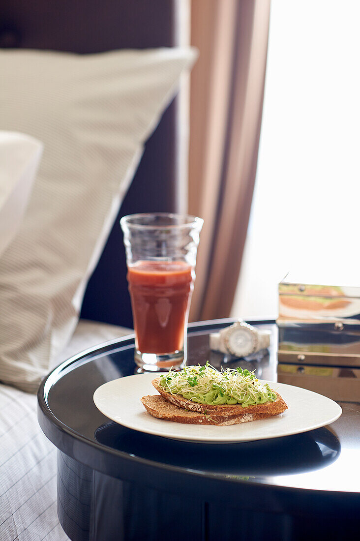 Tartine with guacamole and sprouts