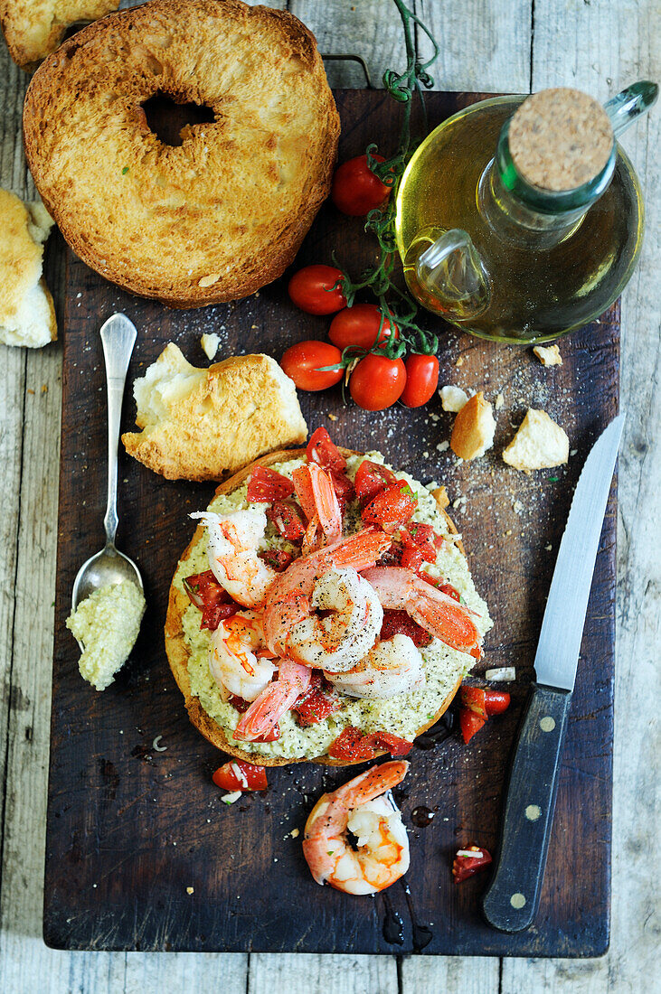 Italian friselle bread with shrimp and vine tomatoes