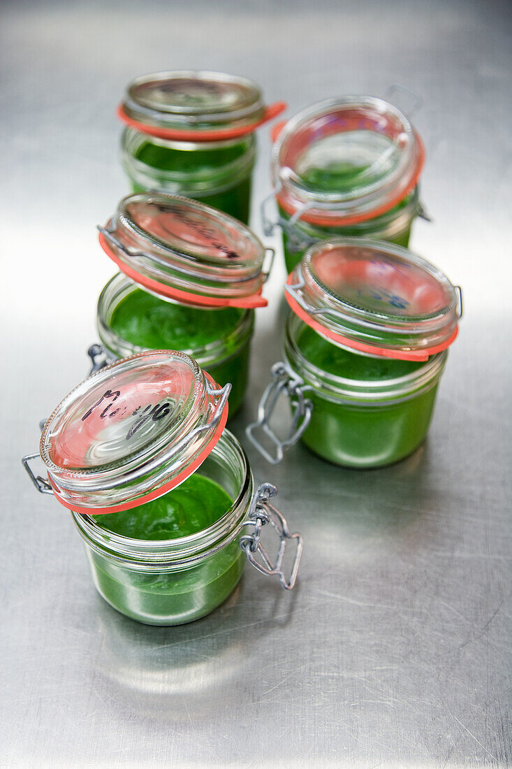 Spinach sauce in jars