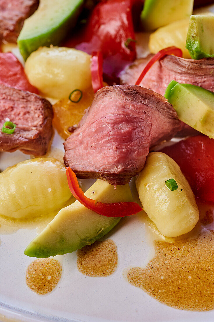 Veal with avocado and gnocchi