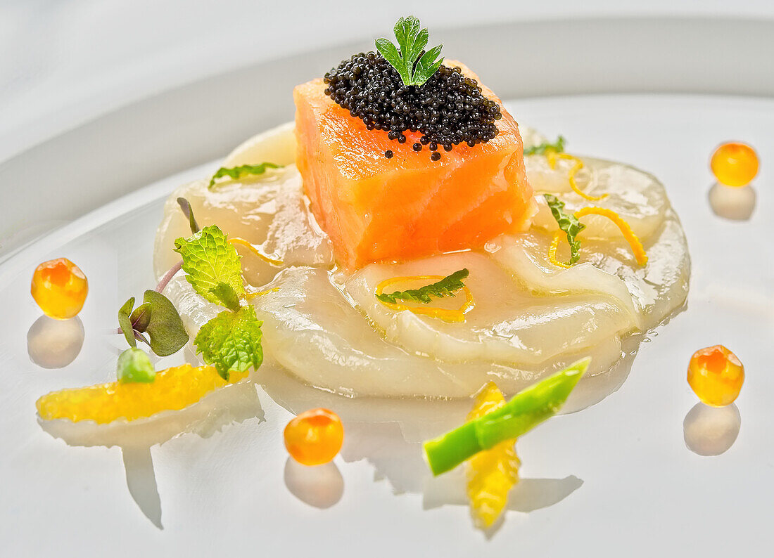 Sea bream and salmon with caviar and vegetables