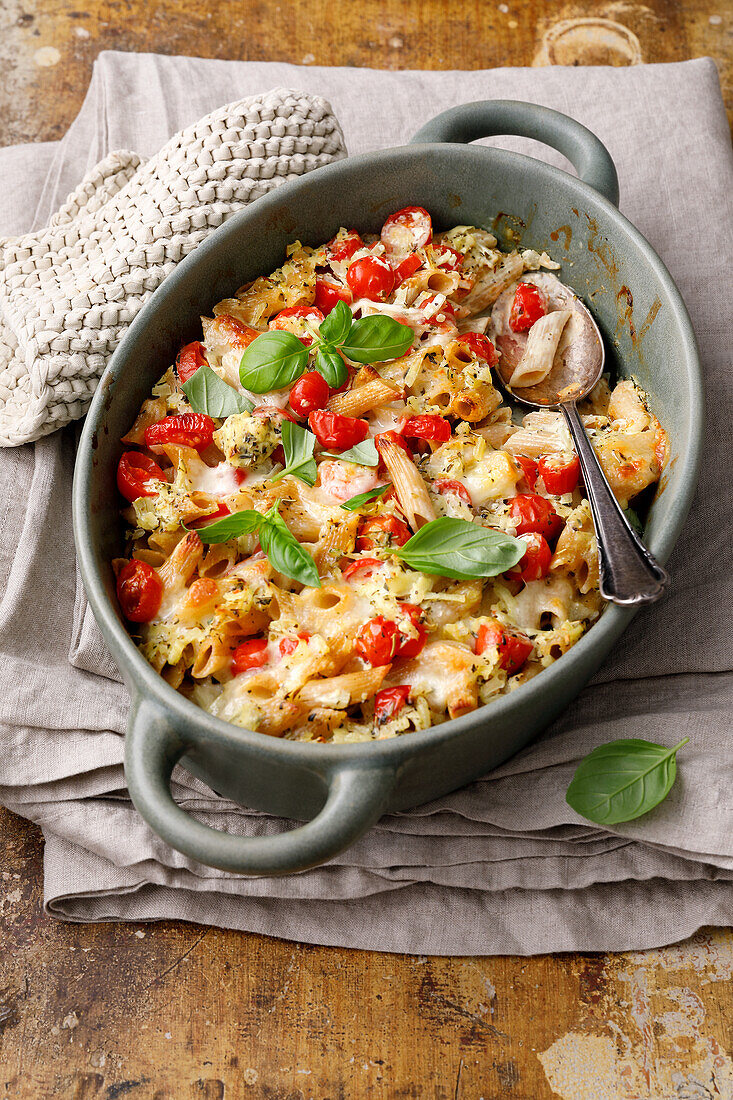 Pasta casserole with tomato-mozzarella with basil