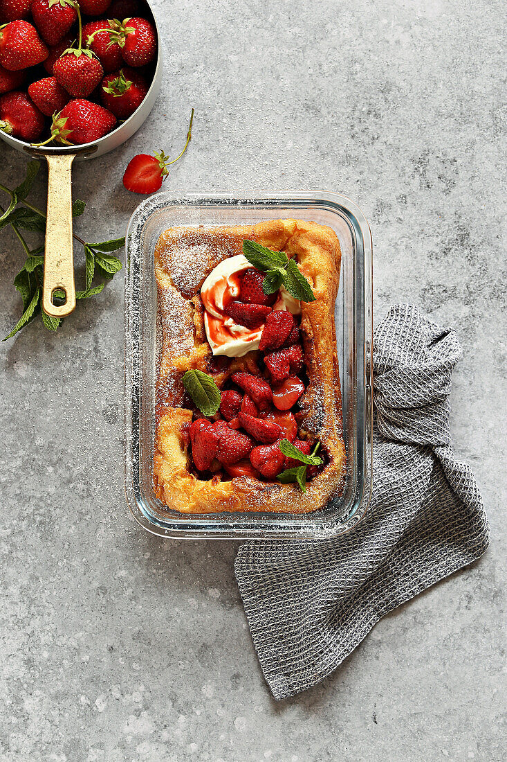 Dutch Baby with Roasted Balsamic Strawberries and Ricotta