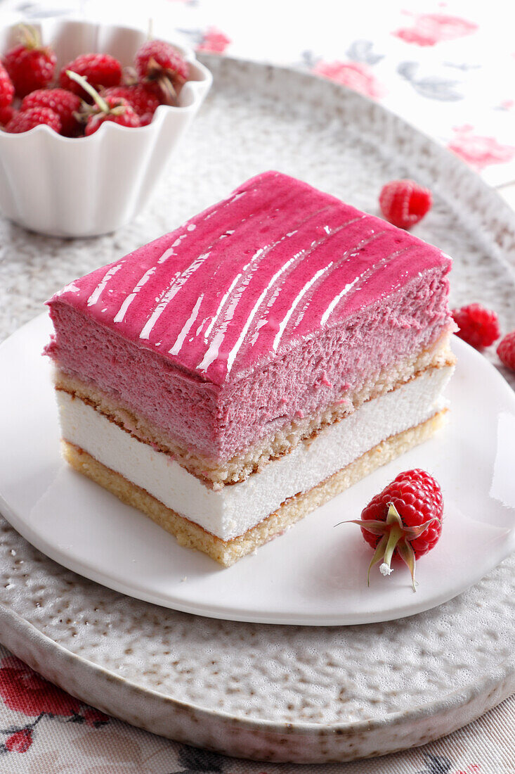 Cake slice with raspberry foam