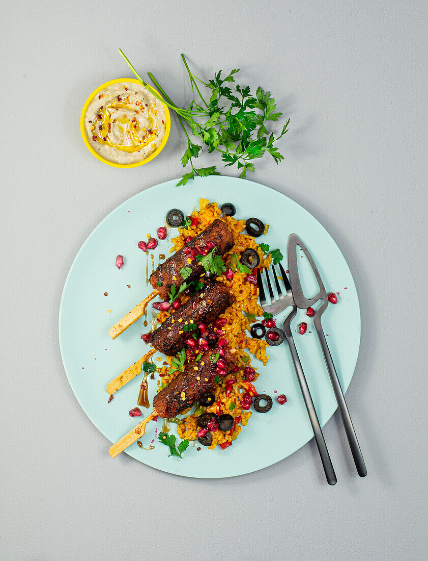 Grilled vegan köfte with djuvec rice and baba ganoush