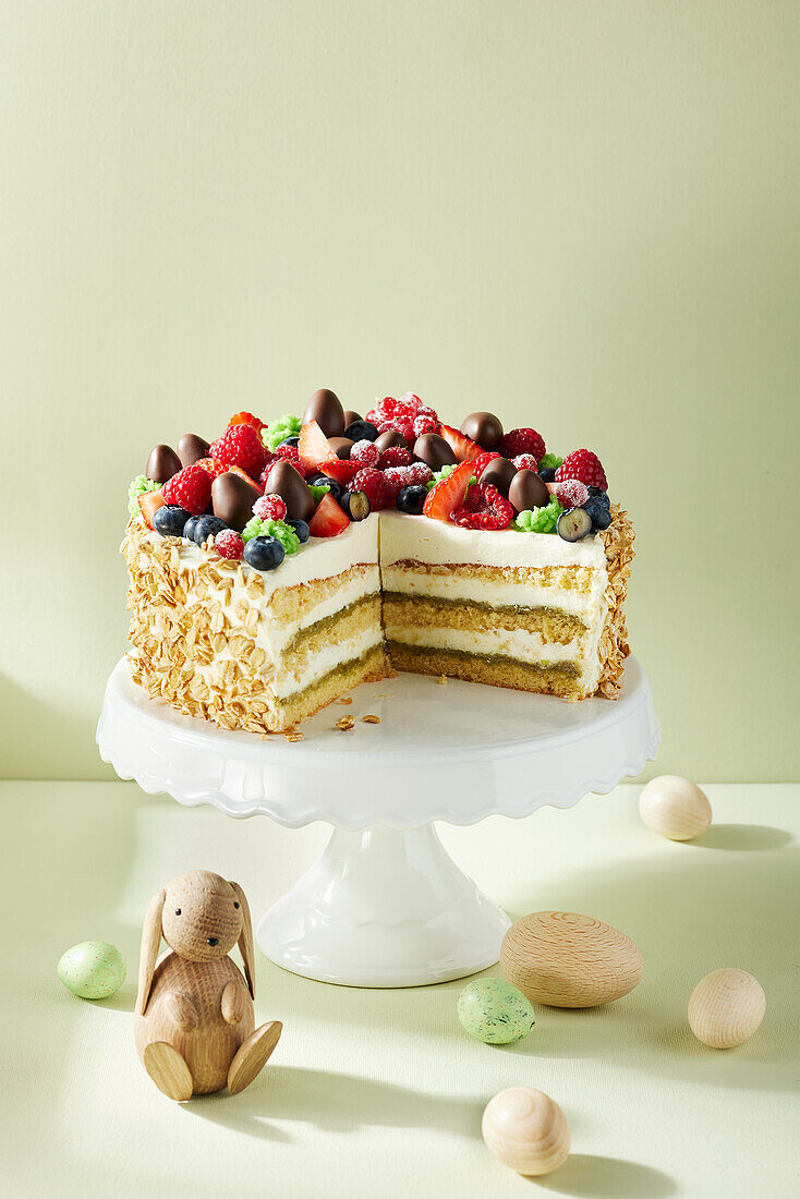 Easter cake with berries and chocolate eggs