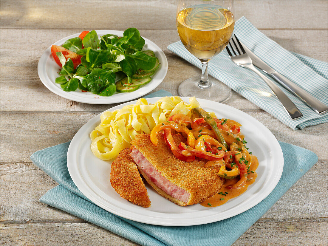Sausage Escalope with paprika sauce and ribbon noodles
