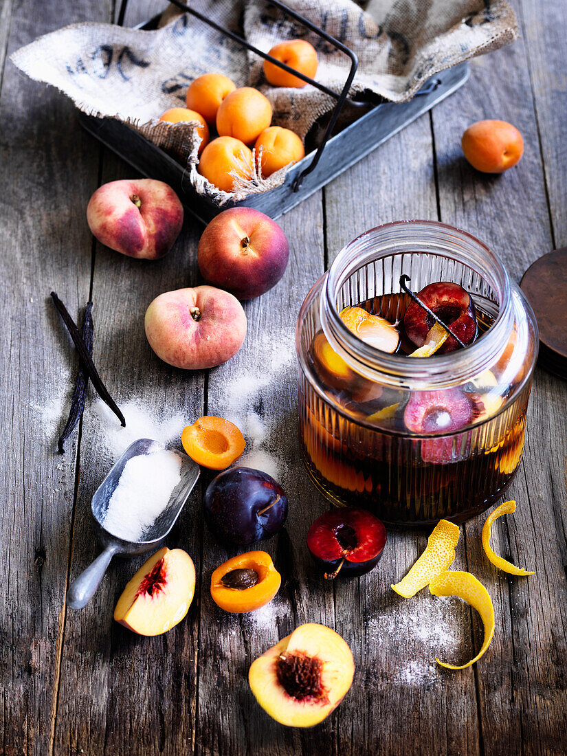 Rum pot with peach, apricot and plum