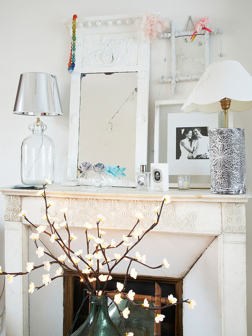 Bedroom fireplace with ornaments and lighting