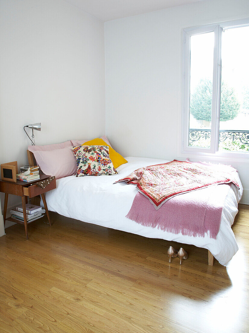 Double bedroom with cushions and blankets