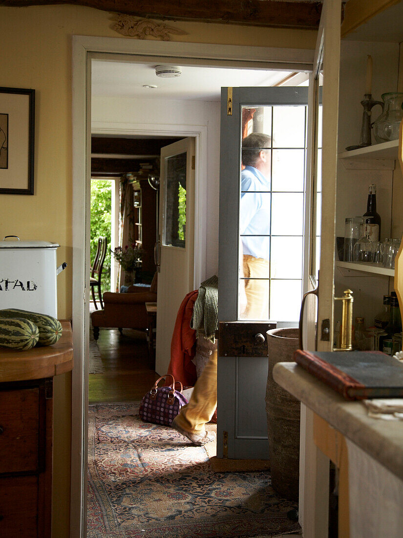 Kitchen with open back door