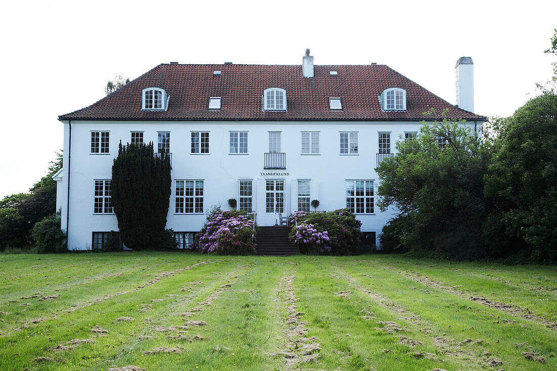 exterior of house and view of garden