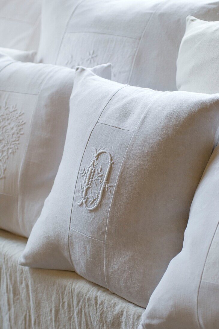 Close up of white pillow with embroidery