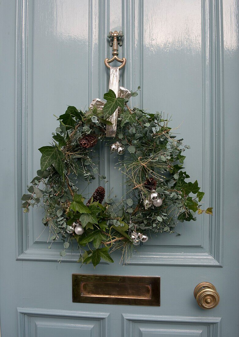 Christmas wreath hanging on door