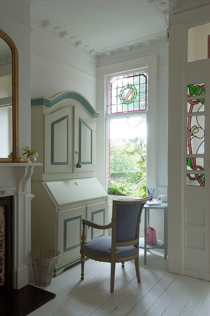 Desk and chair in entrance hallway