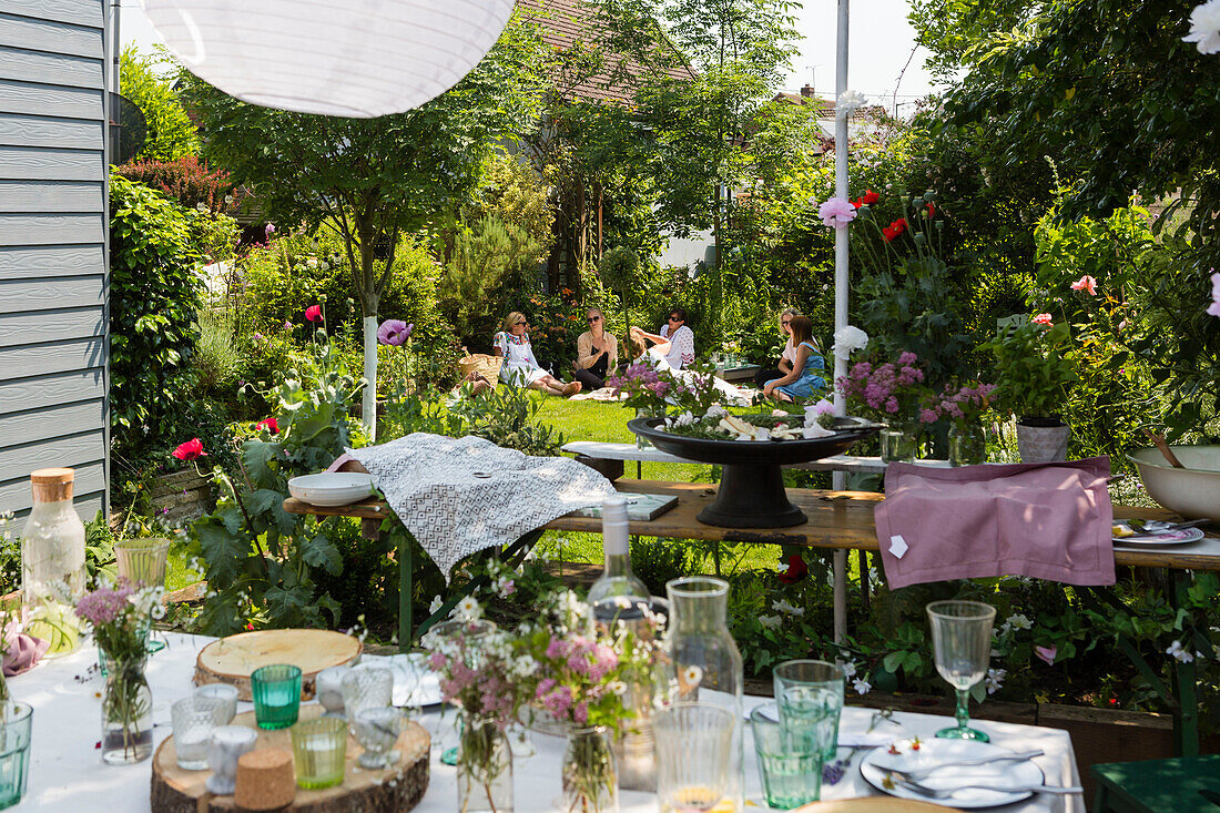 Picnic on the lawn at Mid Summer Party in Colchester garden with friends